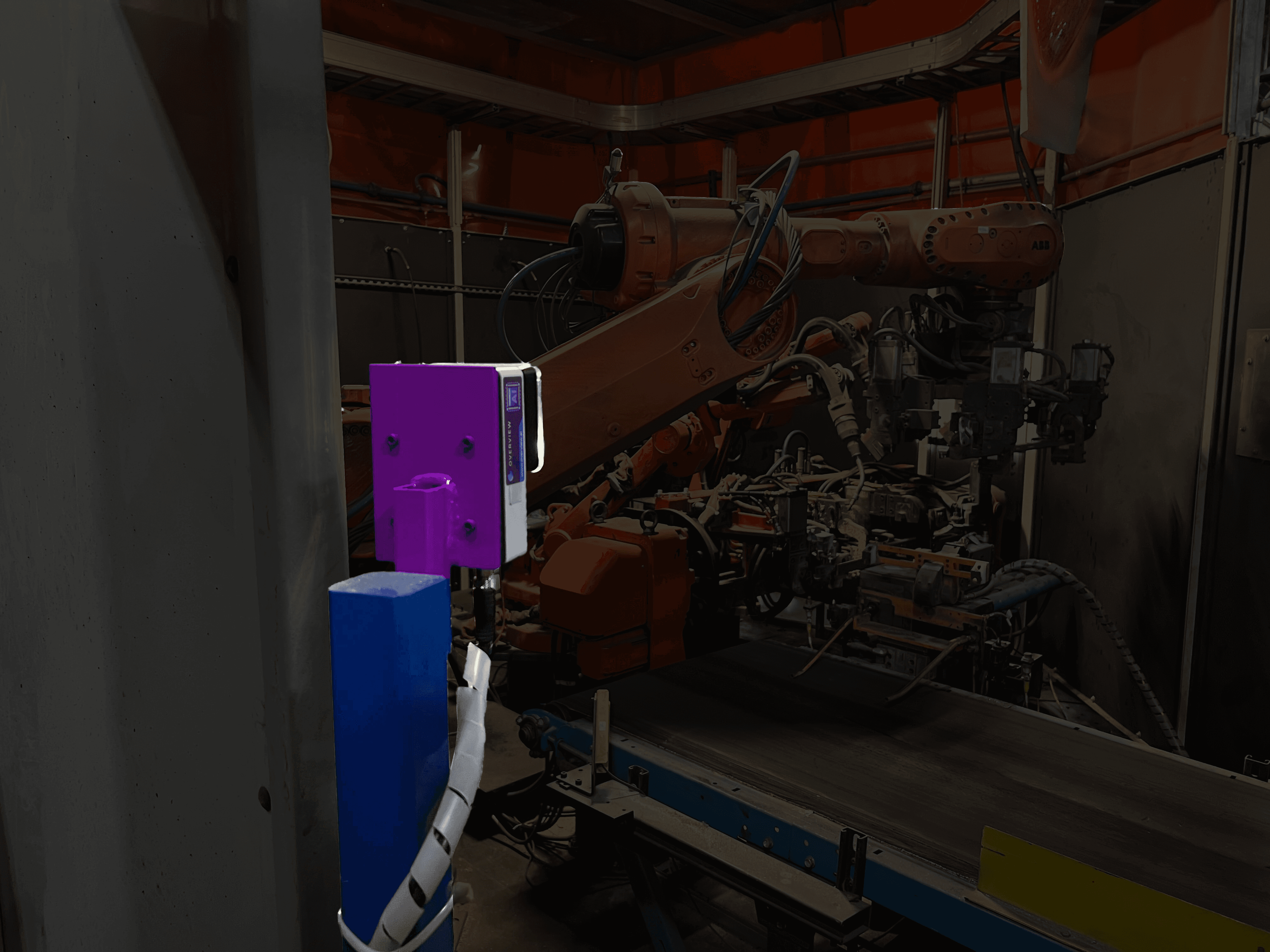 Industrial AI camera performing surface inspection with LED lighting