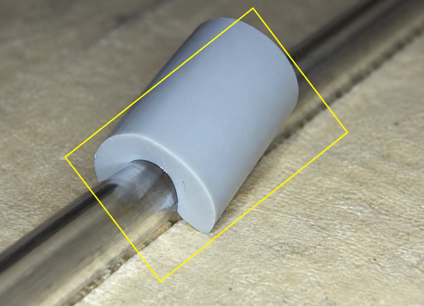 Medical tube keeper inspected for presence and placement on a metal tube