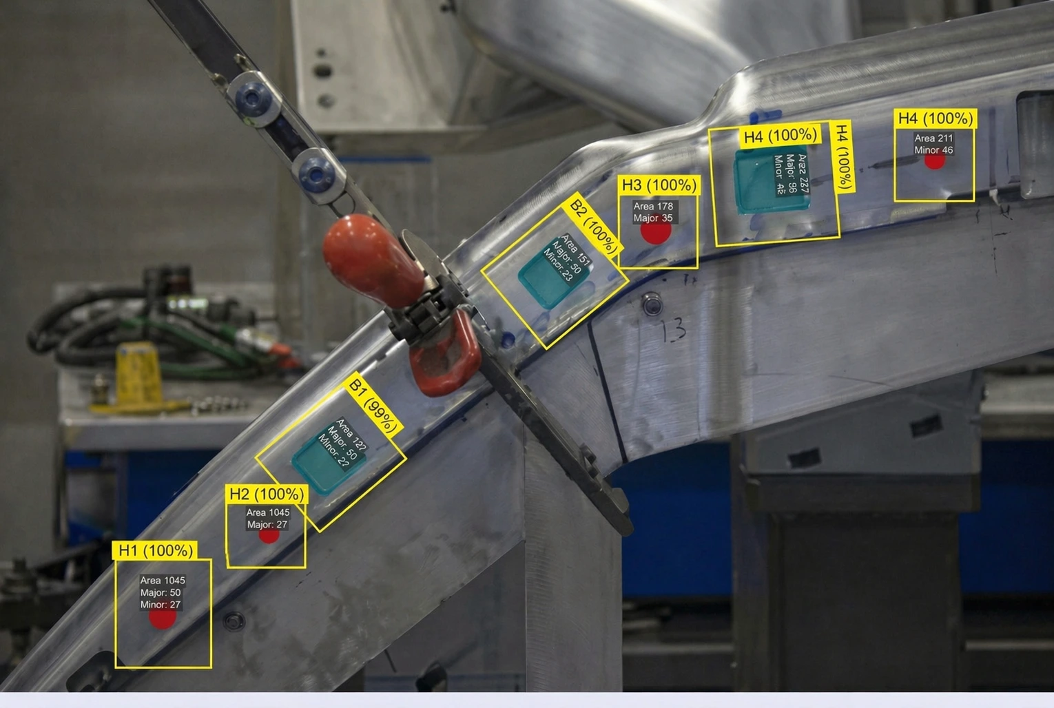 Manufactured lever with seven hole regions inspected for position and size in one capture